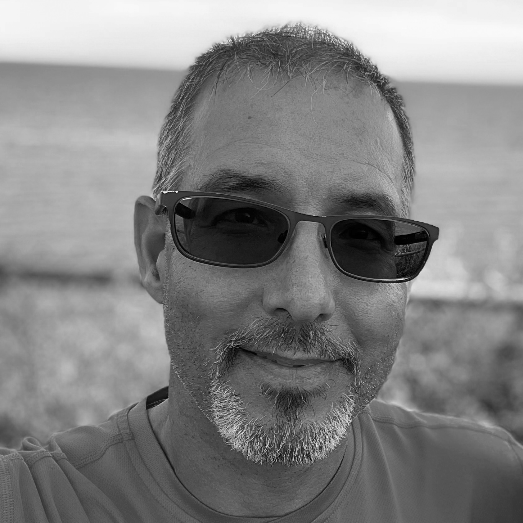 Stephane_Head_Shot_Gray_Scale